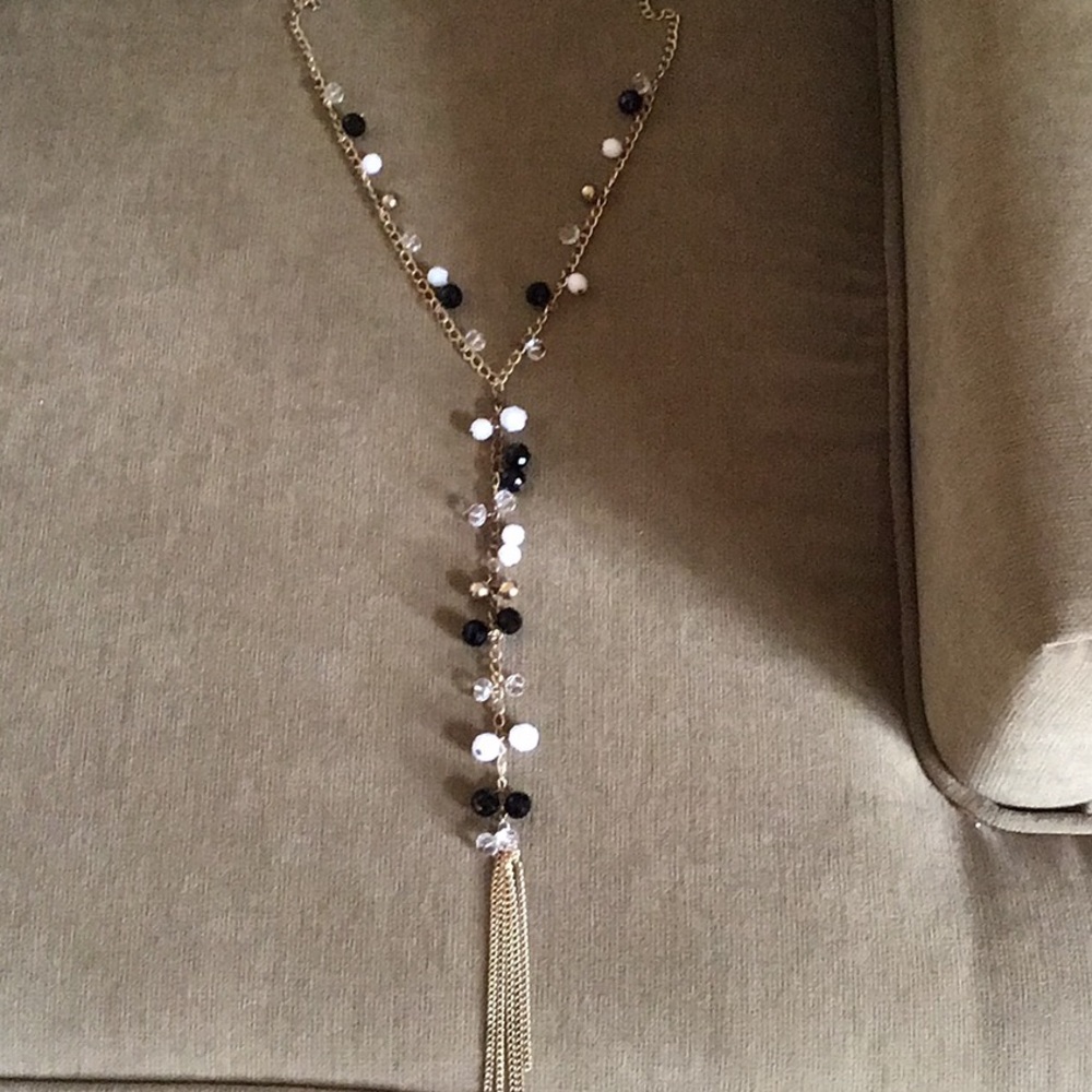 Necklace with tassel.